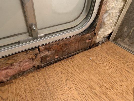 8/18/22 This poorly patched in 2x4 was their big repair to the front wall.  They charged me $2,500 for "Front Window Wall Framing repair".