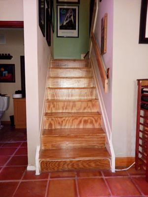 Steam cleaned and coated stairwell area.