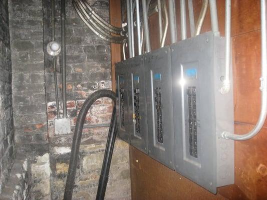 Inside, the 50+ year old first-generation circuit breaker panels would never pass inspection today.