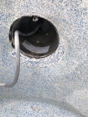 White with a blue quartz patch job to seal the leak on pool light.