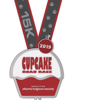 Cupcake Road Race 15k finisher medal.