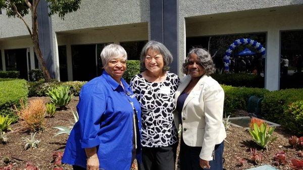 Catherine (Director of Lending), Jeannie (Board Member), and Dr. Gayle (Board Member) during our ribbon cutting ceremony.