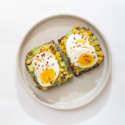 Avocado Toast | avocado, egg, corn, chilly flakes.