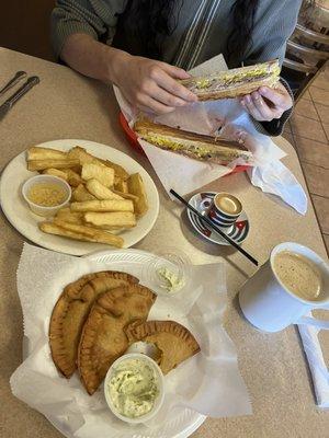 Yuca fritas, Chicken empanada, cafe con leche, cordatito, Cuban special sandwich (Roast Pork)