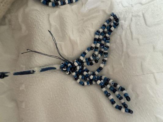 Hand beaded straps of high quality dress that were damaged by Park Blvd Cleaners