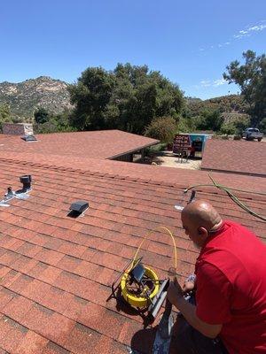 Houses that don't have clean outs sometimes require jetting from the rooftop.