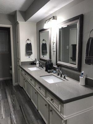 Master bath new mirrors, tile, gray quartz counters, sinks and faucets