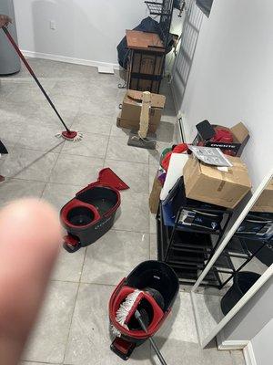 I using three mops and two buckets to try to preserve my house.