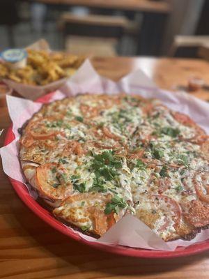 Whole Tomato Pizza ($28) was refreshing and the goat cheese added a nice zing to the palate.