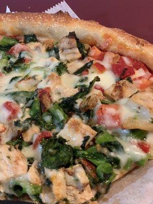 Broccoli rabe, chicken, red peppers, tomatoes, cheese slice