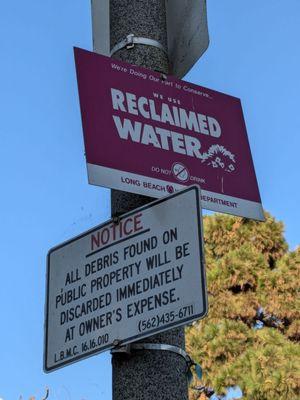 Signs on a streetlight