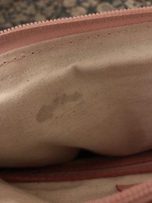 Glue stain on my brand new purse :(