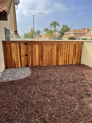 Fence/gate for a dog run on west side of back yard