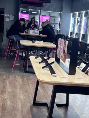 Manager and employees on phones talking not helping with customer complaints