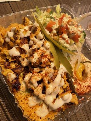 This is why I come here , look at that vibrant deliciousness! Halal Chicken Shawarma Plate.