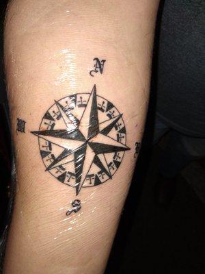 Love my husband's compass don't mind the wrinkle it's the second skin we forgot to snap photo before the second skin was placed lol