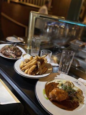 Braised rabbit, zucchini flies ( the bomb ) and ribeyes steak.