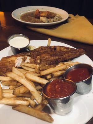 No-batter "beer battered" fish. The dark pieces on the skin are ... spices?