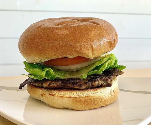 Lamb Burger - we take a leg of lamb, grind it in house, and infuse it with Greek seasonings. #burgers