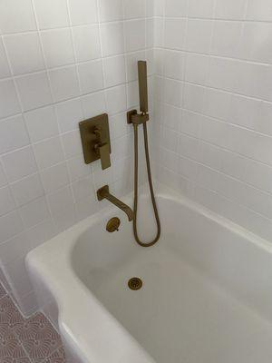 Tub and shower and tub hardware tile wall reglazed