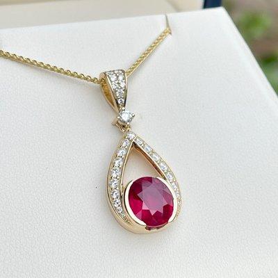 Custom Ruby and diamond pendant in 18k gold