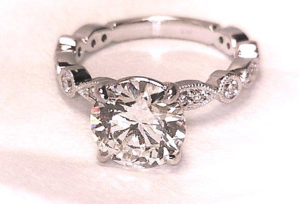 14k white gold custom made engagement ring set with a 2.27 Ct. Lab Grown center diamond.