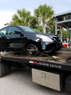 The flat spare tire, after the defective tire was removed