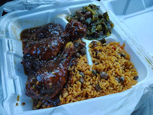 Curry Chicken, rice & gandules, and collared greens.