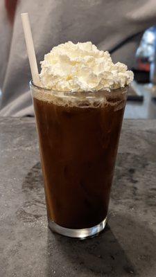 Oat Milk Mexican Cold Brew cocktail with whiskey instead of tequila, topped with vegan coffee brandy whipped cream.