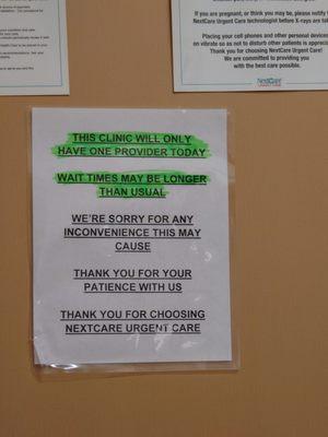 Sign to inform patients of possible longer wait times