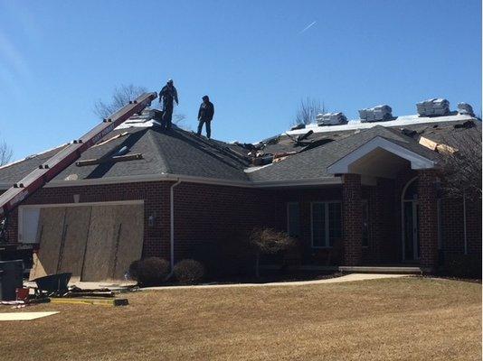 New roof be applied. They took care to place plywood over the windows and doors to protect them