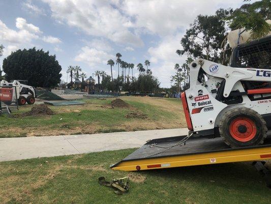 Unloading my Bobcat for work at our construction site.