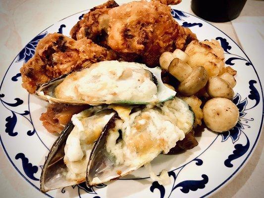 Baked mussels, oyster mushrooms and some pretty massive chicken wings: a bit under-seasoned & too expensive for a $20/person.