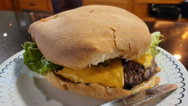 Cheeseburger with just cheese and lettuce