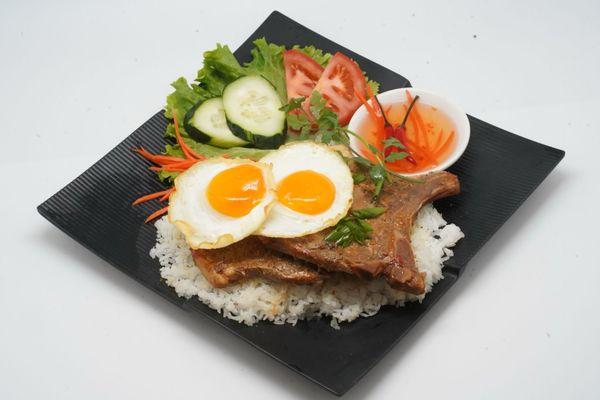 Rice with pork chop and sunny side up egg