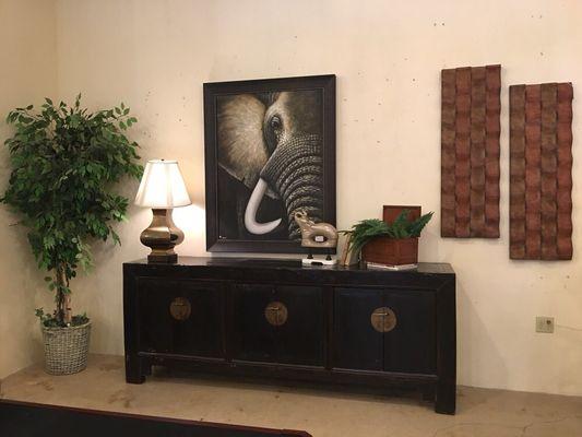 Antique Asian chest with elephant print.