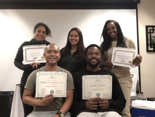 Students completing Reiki I & II training.