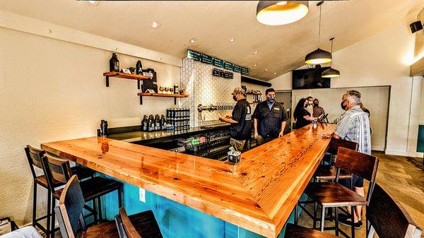 Our bar made with reclaimed wood from the building itself.