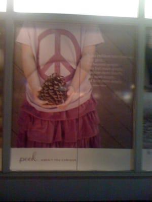 Window display with one of the Peace tees