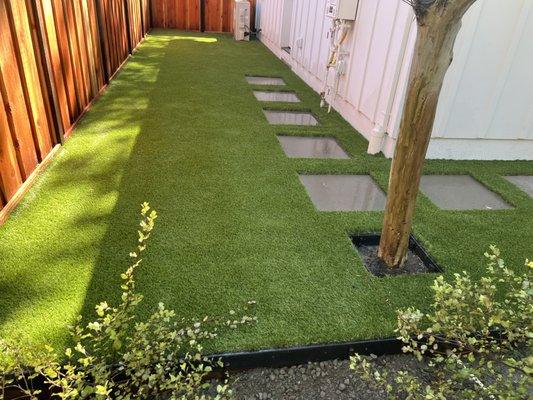 Stepping stones with artificial grass