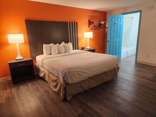 Rooms with classic Howard Johnson's famous orange and blue accents.