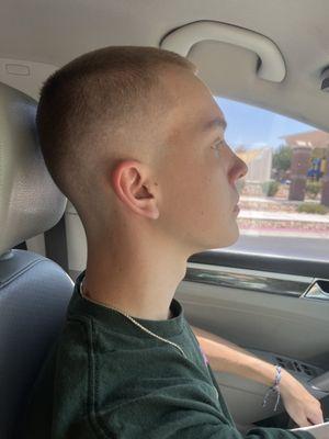 Buzz cut with mid skin fade