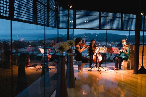 Trio at the DeYoung Musuem.  Photo by Orange Photography