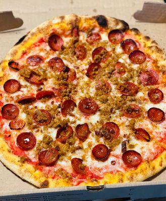 Pepperoni, sausage and garlic pizza