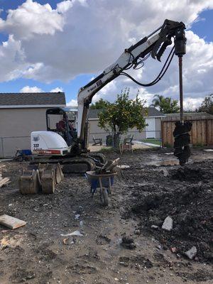 Garage slab foundation with piers