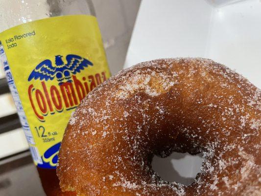 A Classic sugar coated donut along with my first time trying a Colombian soda