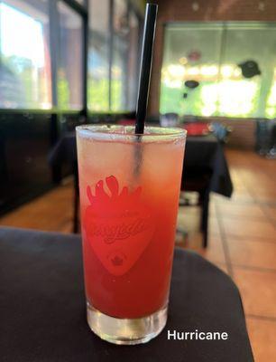 Hurricane (light rum, dark rum, OJ, passion fruit, lime, grenadine, sugar syrup) $9.99