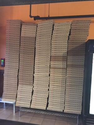 A pile of pizza boxes