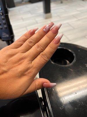 Ombré coffin shaped nails with marble ring finger.