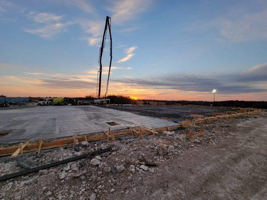 Concrete pump truck placing concrete